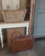 Oude antieke leren koffer, Ophalen