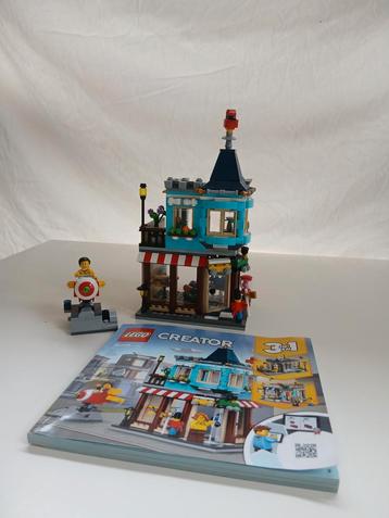 Mooie Lego Creator sets woonhuis en speelgoedwinkel 31105 beschikbaar voor biedingen