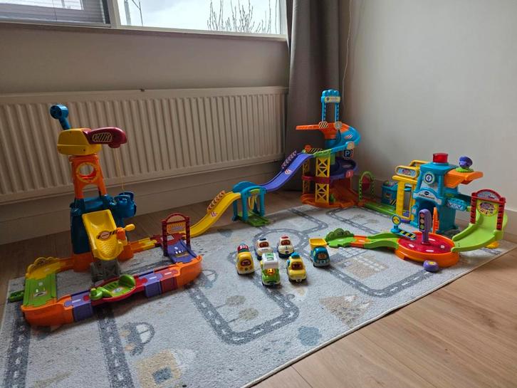 VTech Toet Toet politiebureau, parkeertoren, bouwplaats, Kinderen en Baby's, Speelgoed | Vtech, Zo goed als nieuw, Ophalen
