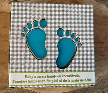 Baby’s eerste hand-en voetafdruk. 