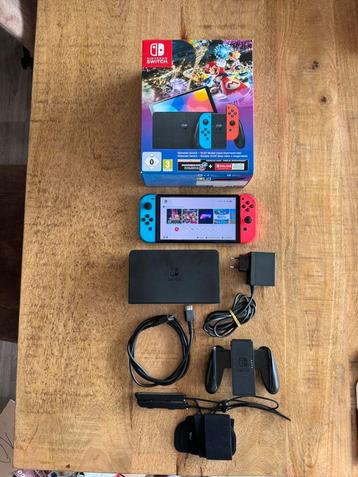 Nintendo Switch OLED met doos en originele accessoires beschikbaar voor biedingen