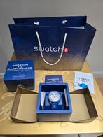 Moonswatch MISSION TO EARTHPHASE MOONSHINE GOLD SO33N703L, Sieraden, Tassen en Uiterlijk, Horloges | Heren, Kunststof, Polshorloge