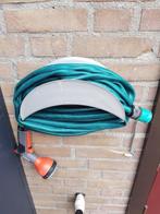 Tuinslang 11 meter met gardena koppelstukken en haspel, Ophalen, Gebruikt, Tuinslang