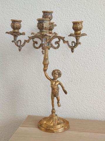 Koperen antieke kandelaar  beschikbaar voor biedingen