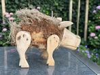 Houten Varken, Ophalen