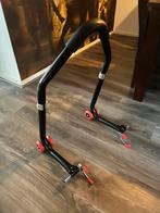 Paddockstand motorfiets (motorbok), Ophalen