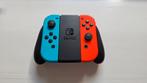 Origineel en Gloednieuw!2 Joy cons, Grip holder, 2 strap ons, Ophalen of Verzenden, Nieuw, Met 2 controllers, Switch Original