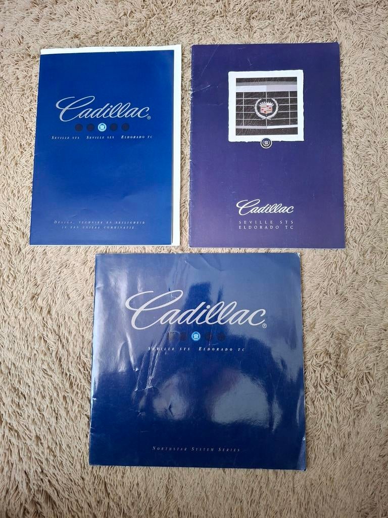 3x autofolder Cadillac Seville/Eldorado, Verzenden, Zo goed als nieuw, Overige merken