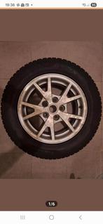 Opel insignia winterbanden met lichtmetalen velgen, Ophalen