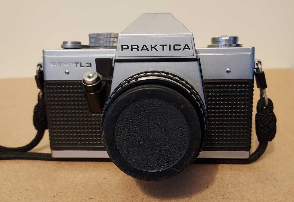 Praktica super TL3 spiegelreflexcamera als nieuw, Audio, Tv en Foto, Fotocamera's Analoog, Ophalen of Verzenden, Zo goed als nieuw