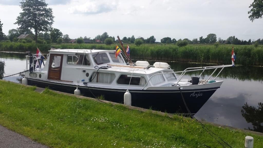 Stalen motorkruiser met achterkajuit. (AK), Ophalen, Gebruikt, Staal, 50 pk of meer