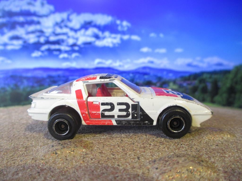 1:56 Mazda RX-7 - Majorette wit racing #23, Hobby en Vrije tijd, Modelauto's | Overige schalen, Ophalen of Verzenden, Gebruikt