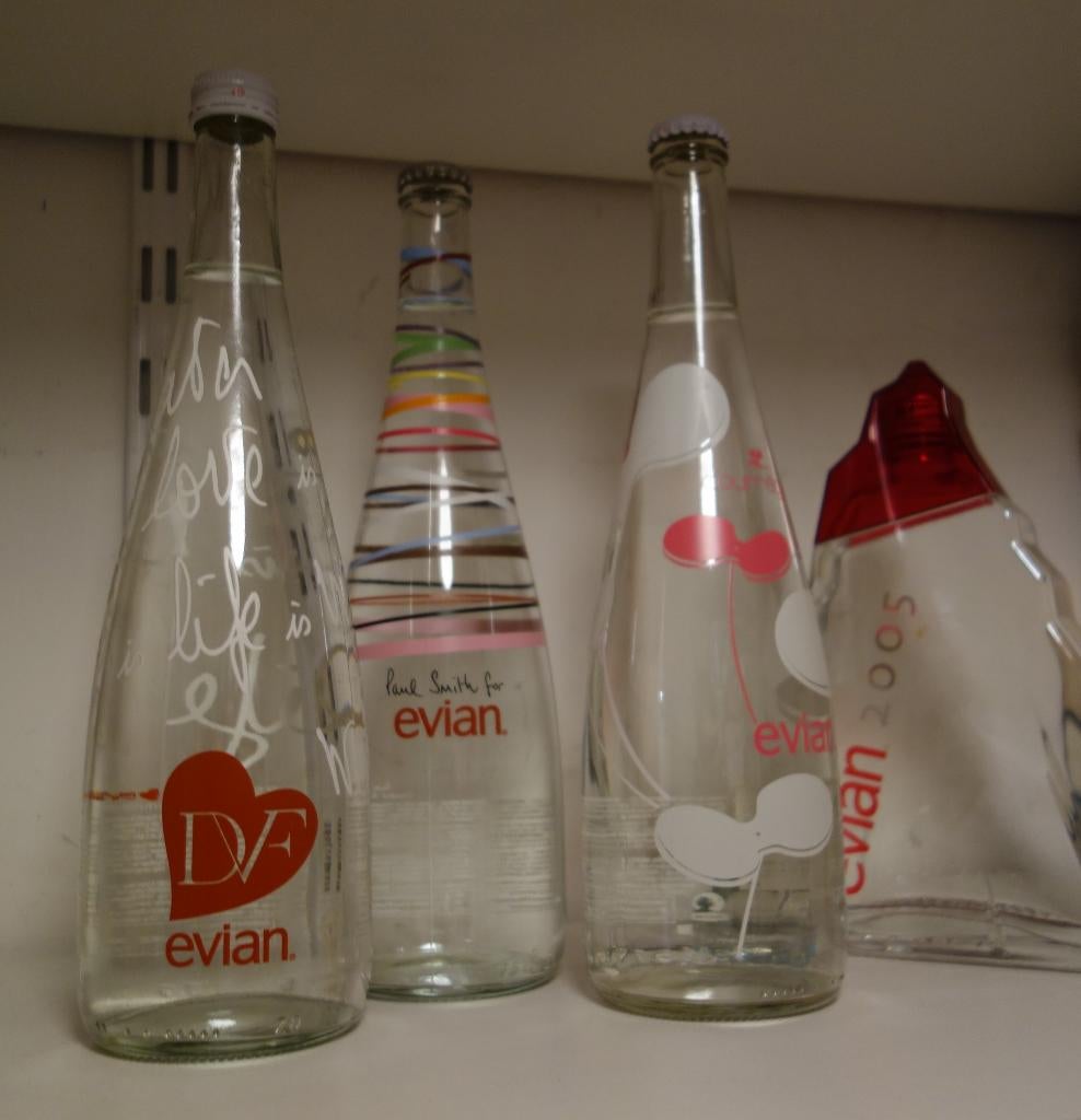 Vier jaarflessen van Evian, Ophalen of Verzenden, Nieuw, Overige typen