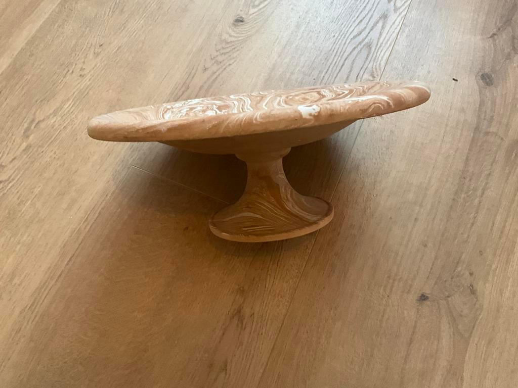 Ronde schaal of plateau, Ophalen