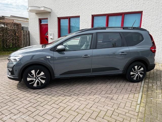 Dacia Jogger 1.6 Hybrid 140 Expression 7p., Auto's, Dacia, Stof, Gebruikt, Zwart, 4 cilinders