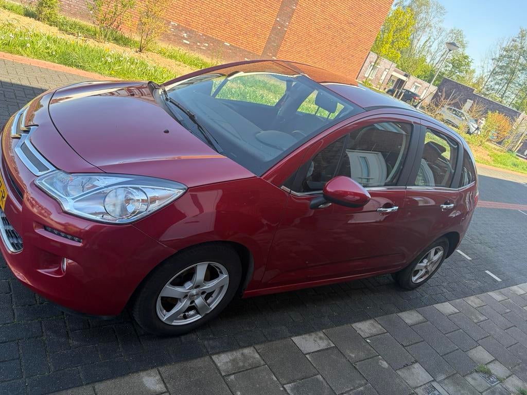 Citroën C3 1.2 Puretech 82pk 2016 Rood, Auto's, Citroën, Voorwielaandrijving, Stof, 1199 cc, 23 km/l