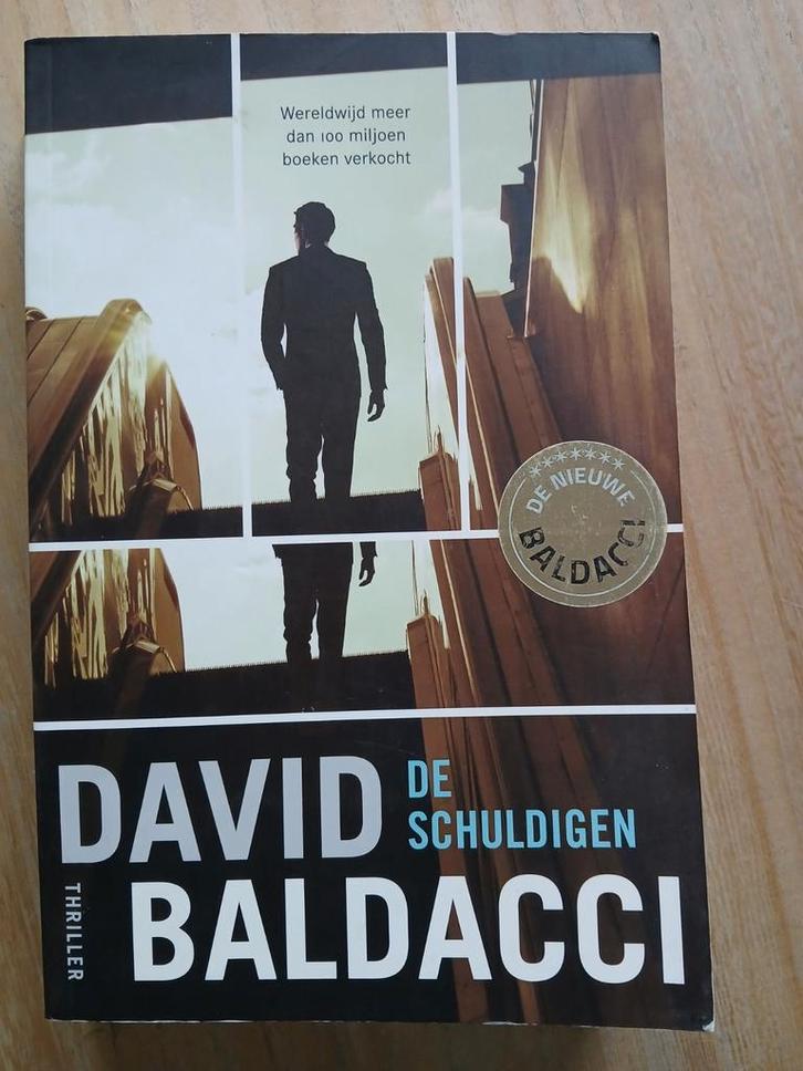 David Baldacci - De Schuldigen, Boeken, Thrillers, Zo goed als nieuw, Nederland, Ophalen of Verzenden