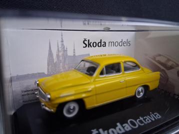 Skoda Octavia geel 1:72 Nieuw in doos beschikbaar voor biedingen