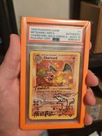 1999 Charizard Shadowless Mitsuhiro Artita Signed PSA AUTO10, Hobby en Vrije tijd, Verzamelkaartspellen | Pokémon, Ophalen of Verzenden