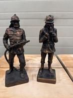 Twee zware brandweermannen beelden, Ophalen