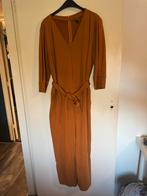 Mooie jumpsuit okergeel/brons van Hema maat XL, Kleding | Dames, Jumpsuits, Ophalen of Verzenden, Zo goed als nieuw, Maat 46/48 (XL) of groter