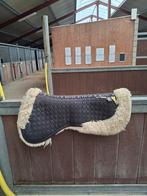 Zadel onderleggers (bontje), Ophalen