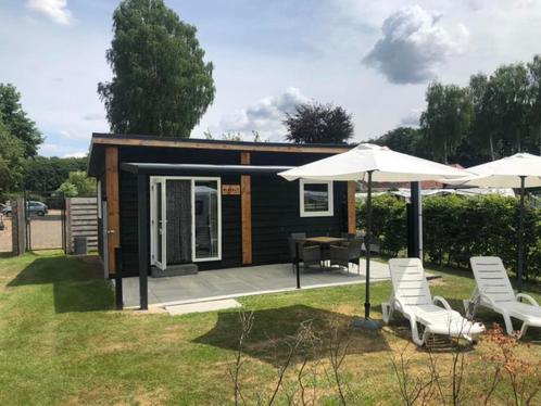 te huur 4 persoons blokhut, Caravans en Kamperen, Caravans, Bedrijf, tot en met 4, Rondzit, Airco, Douche, Ophalen