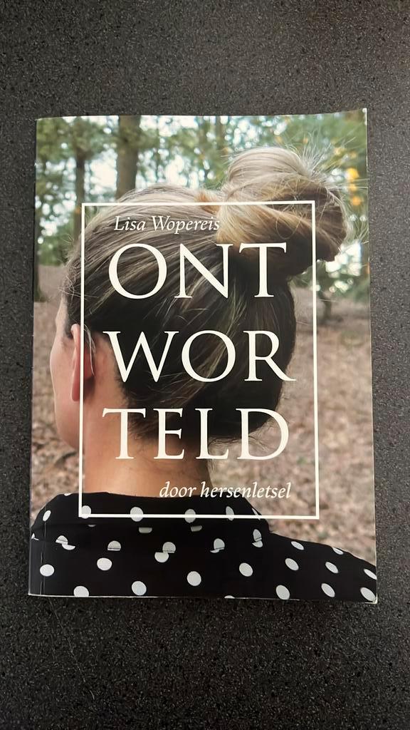 Lisa Wopereis - Ontworteld door hersenletsel, Boeken, Overige Boeken, Zo goed als nieuw, Ophalen of Verzenden