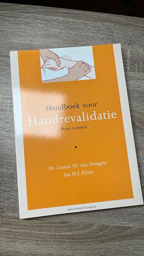 L.M. van Dongen - Handboek voor handrevalidatie, Boeken, Wetenschap, Zo goed als nieuw, Ophalen of Verzenden