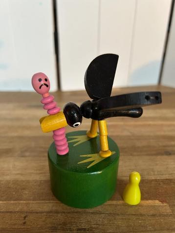 Janod zwarte vogel met worm klik klak speeltje beschikbaar voor biedingen