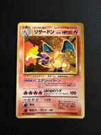 Base set Charizard met swirl! (1996), Ophalen of Verzenden, Zo goed als nieuw, Meerdere kaarten