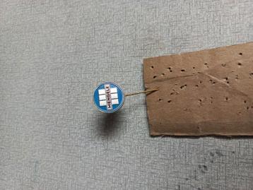 Metalen speldje van " Mengele" beschikbaar voor biedingen