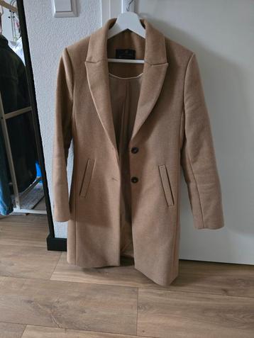 Mooie beige jas - Maat 34 van c&a  beschikbaar voor biedingen
