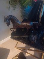 Zware bronzen paard (kunst), Ophalen