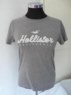 Grijs tshirt met witte opdruk Hollister, mt 170 XS, Ophalen of Verzenden, Zo goed als nieuw, Korte mouw, Maat 34 (XS) of kleiner