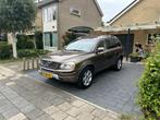 Volvo XC90 2.4 D5 Geartronic AWD 7-ST 2012 Bruin, Auto's, Euro 5, USB, Bruin, 7 stoelen
