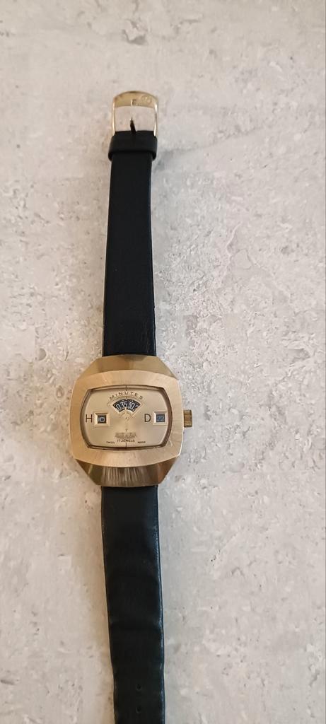 Zeldzame Sicura Jump Hour (Breitling) Herenhorloge Jaren 70, Antiek en Kunst, Antiek | Goud en Zilver, Ophalen of Verzenden