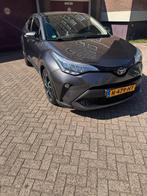 Toyota C-HR 1.8 Hybrid 122pk CVT 2021 Grijs, Auto's, Stof, 4 cilinders, SUV of Terreinwagen, 1395 kg