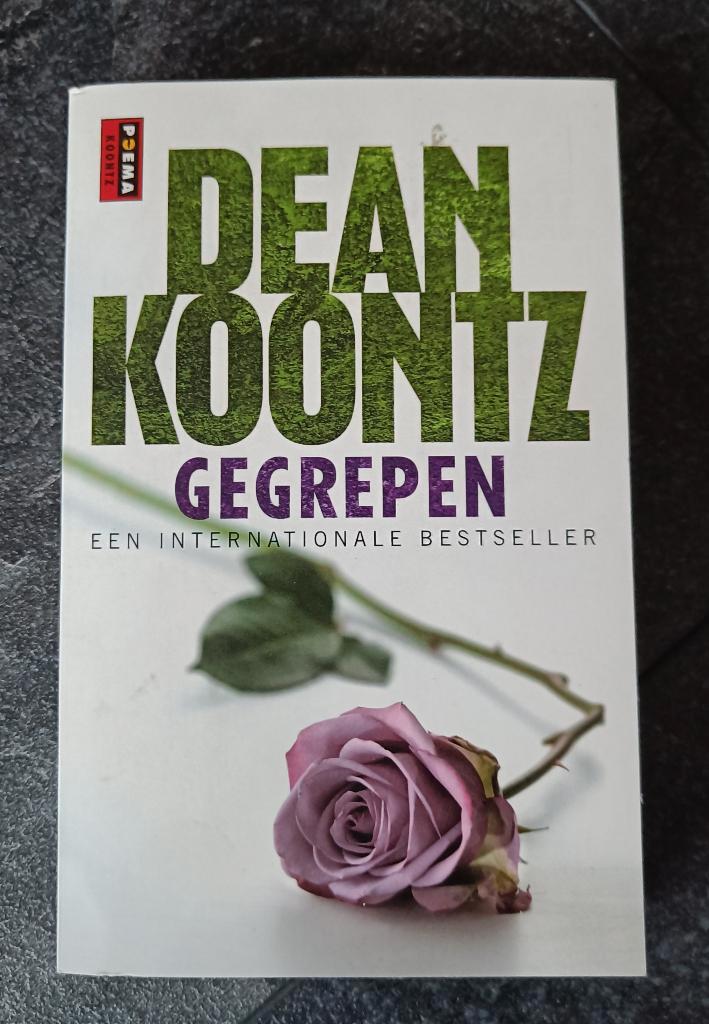 Gegrepen (Dean Koontz), Boeken, Thrillers, Zo goed als nieuw, Ophalen of Verzenden