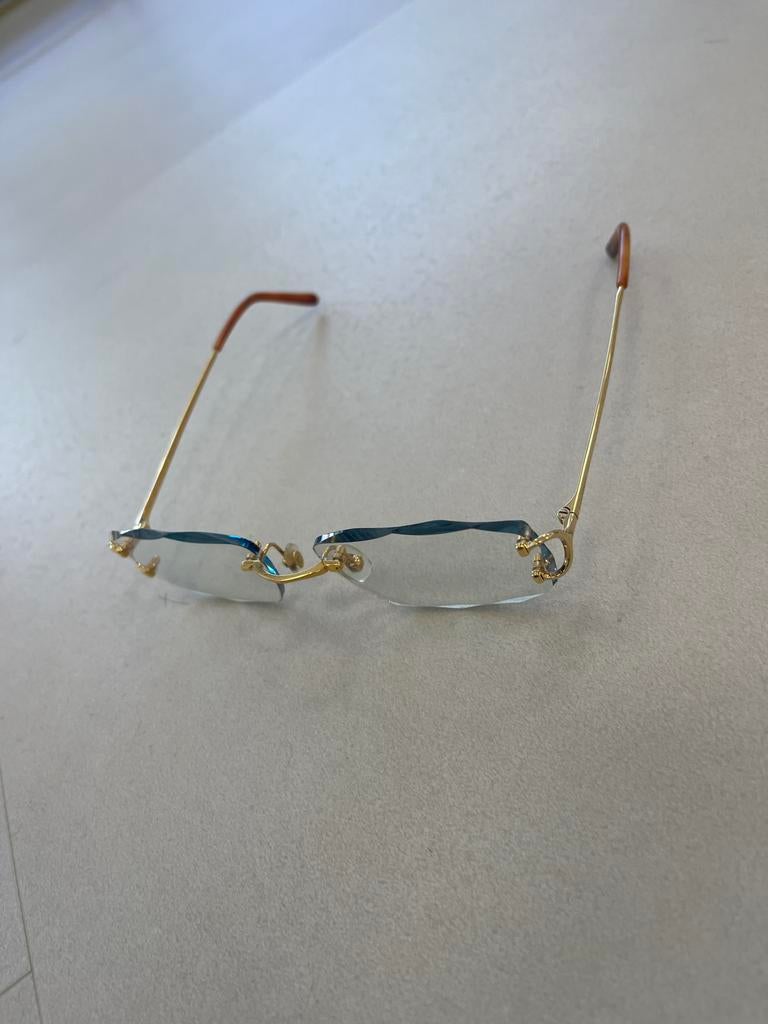 Cartier bril met meekleurende glazen, Overige merken, Gebruikt, Blauw, Ophalen of Verzenden