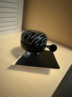 Zwarte fietsbel met wit streepjespatroon, Ophalen, Nieuw