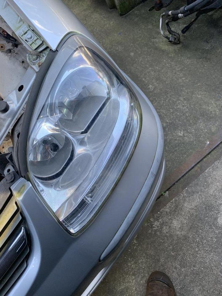 koplamp links nissan almera tino 2003 tot 2006 26010BU800, Auto-onderdelen, Verlichting, Nissan, Gebruikt, Ophalen of Verzenden