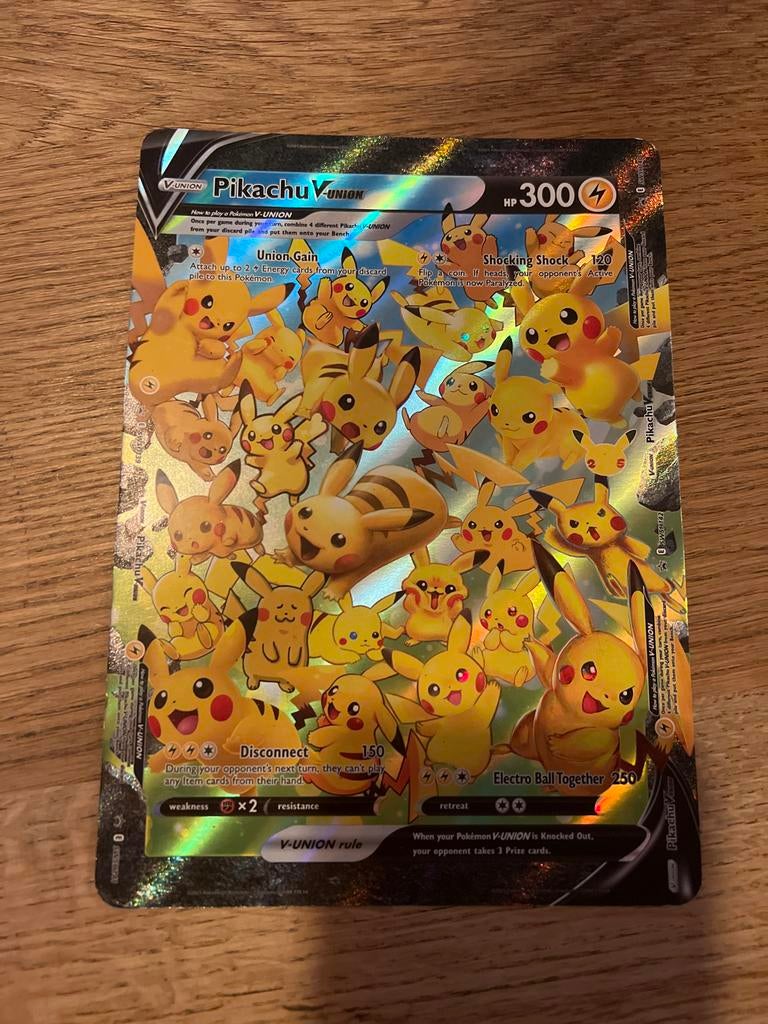 Pokémon Pikachu V-union jumbo SWSH142, Ophalen of Verzenden, Zo goed als nieuw, Losse kaart, Foil