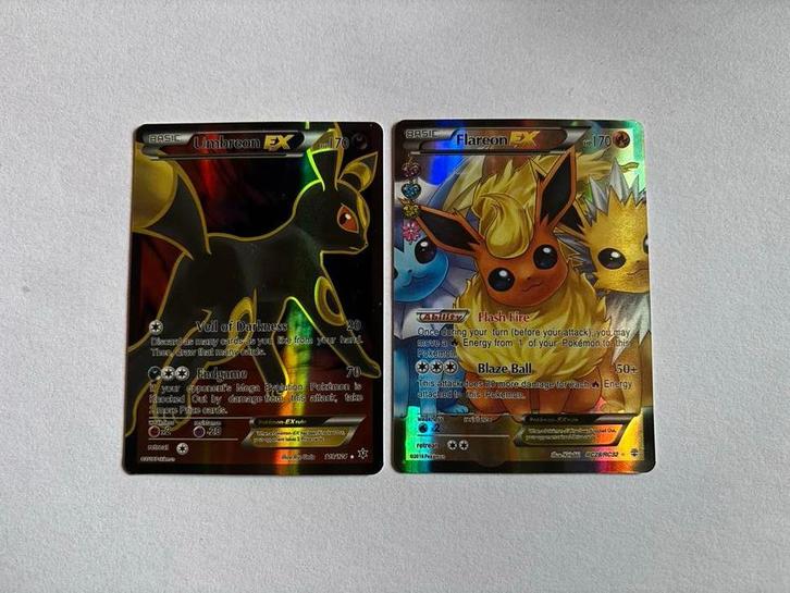 Umbreon ex en Flareon ex Pokémon kaarten, Hobby en Vrije tijd, Verzamelkaartspellen | Pokémon, Zo goed als nieuw, Meerdere kaarten