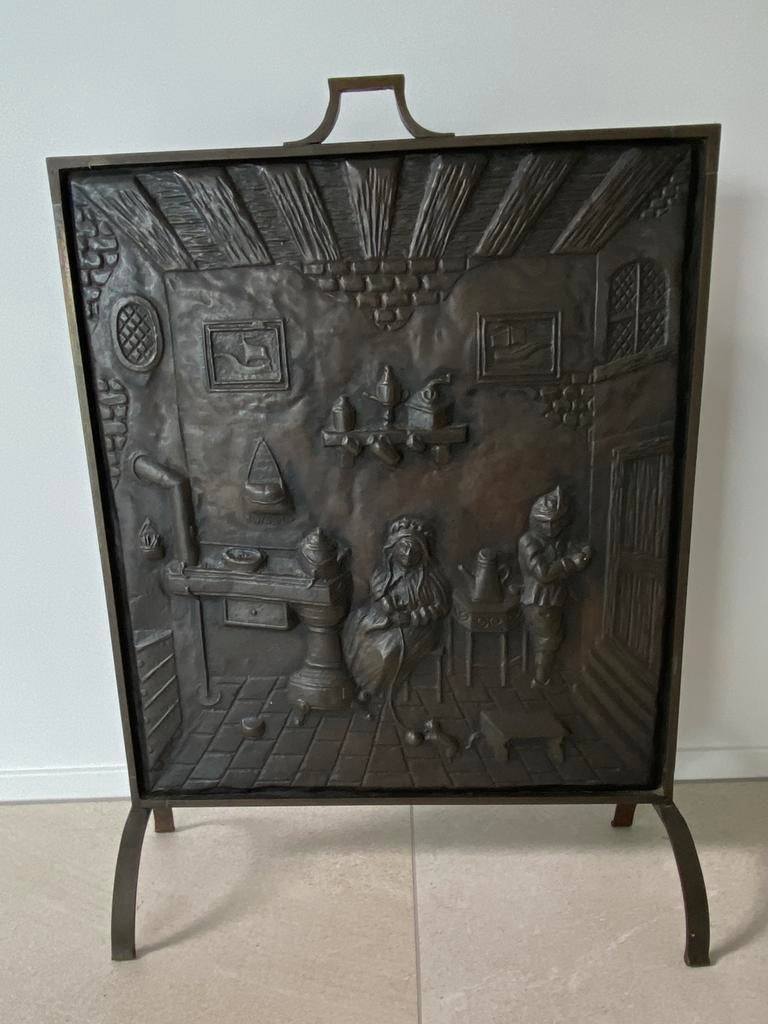 Antiek koperen haardscherm met reliëf, Ophalen