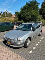 Toyota Corolla 1.3 HB Linea Terra AUT 1999 Grijs, Auto's, 40 €/maand, Corolla, Origineel Nederlands, 1000 kg