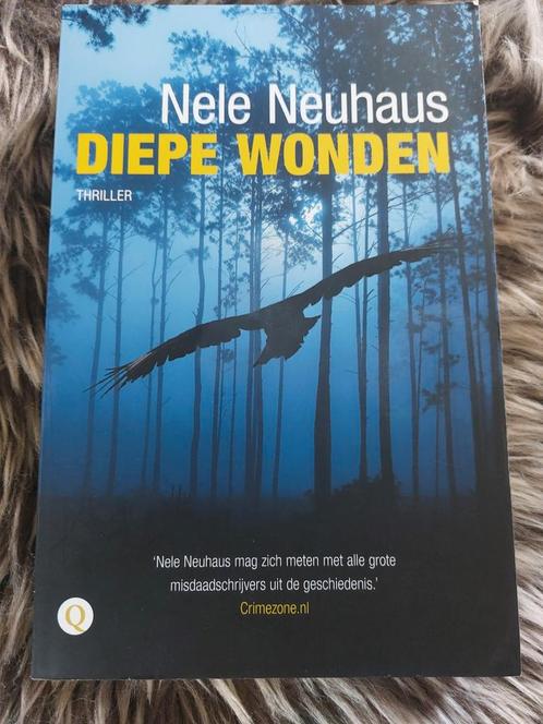 Thriller • Nele Neuhaus - Diepe wonden, Boeken, Thrillers, Zo goed als nieuw, Ophalen of Verzenden