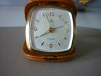 Vintage  reiswekker  Lumen - 7 Jewels - jaren 50/60-  izgst, Antiek en Kunst, Antiek | Klokken, Ophalen of Verzenden