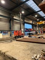 Grond en heiwerk, plaatsen stalen buispalen