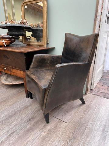 Vintage leren fauteuils beschikbaar voor biedingen